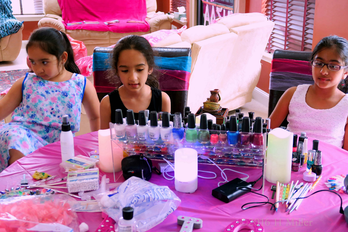 The Girls Checking Out The Polish Colors And Styles. 