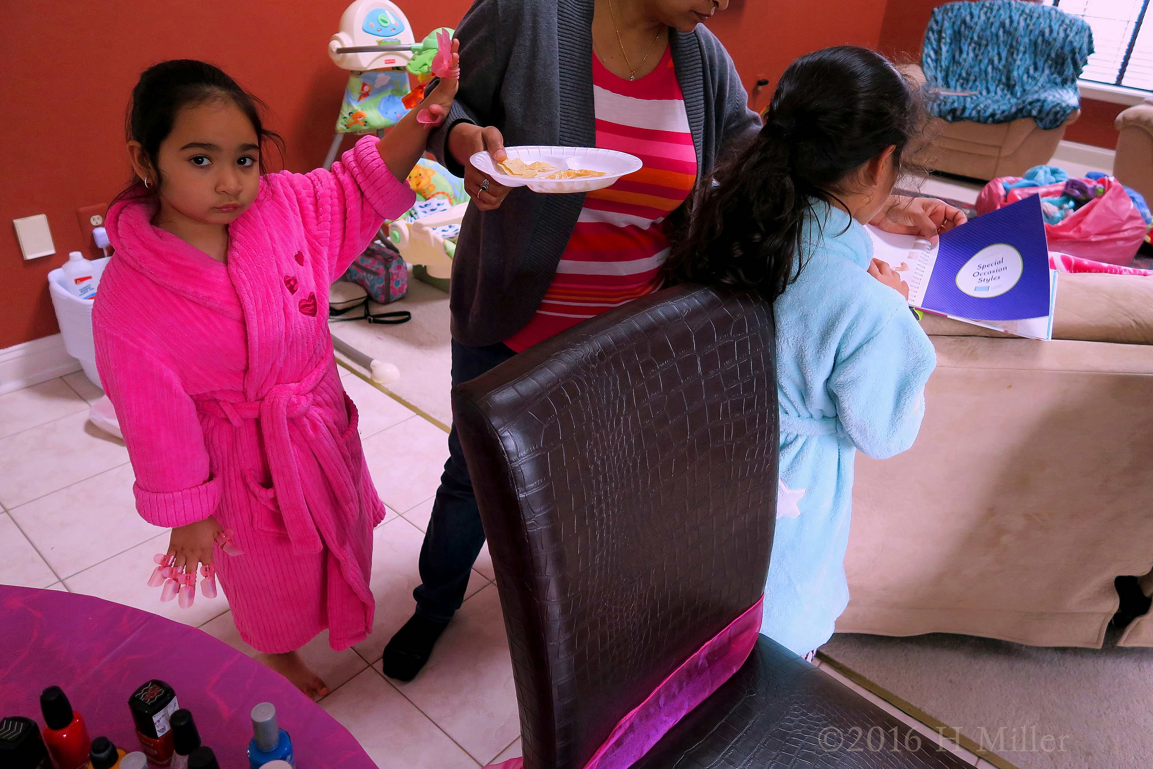 Checking Out The Books On Styling With Mom. Checking Out The Books On Styling With Mom.