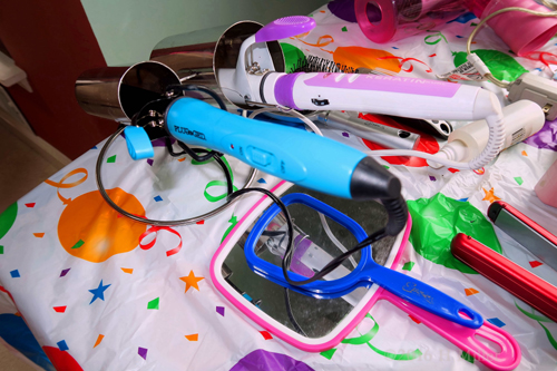 Hot Curler And Iron Safely In Protective Sleeve To Prevent Burns Hot Curler And Iron Safely In Protective Sleeve To Prevent Burns