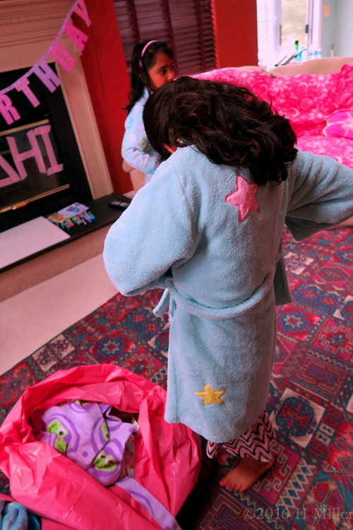 Tying The Sash On Her Robe.