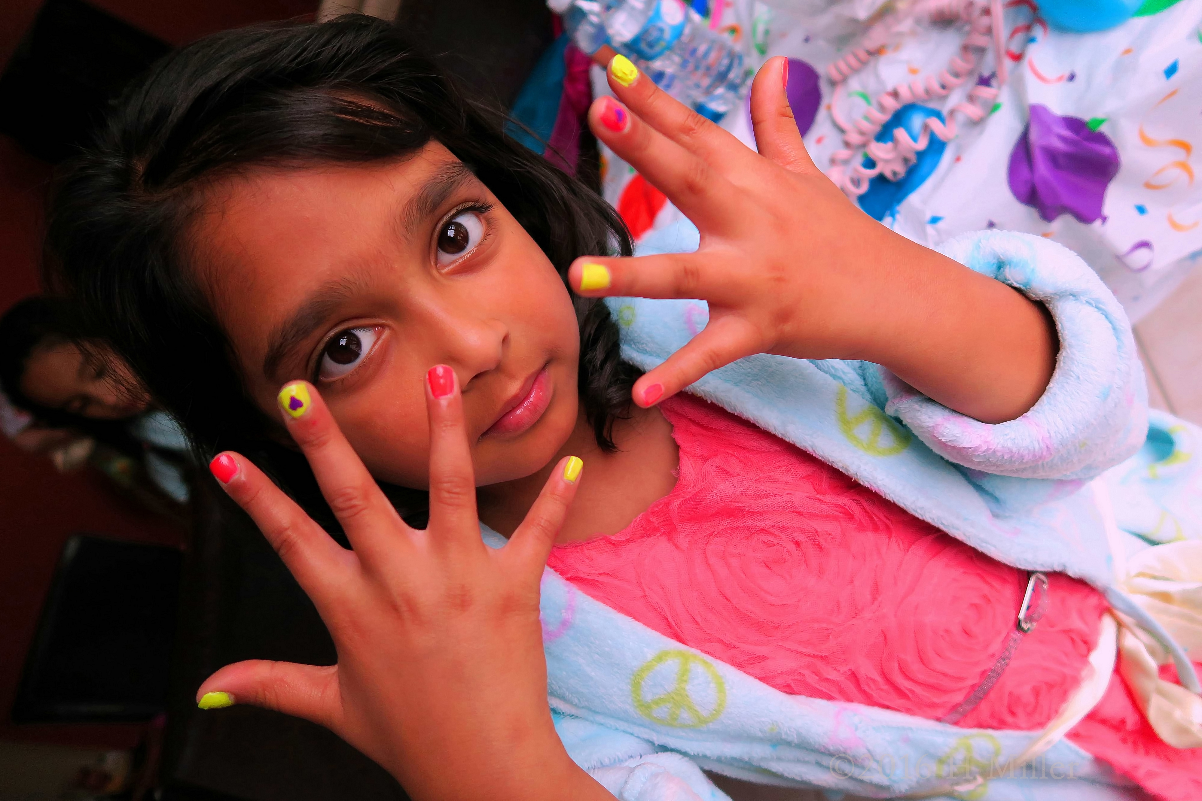 Pink And Yellow Kids Manicure With Hearts. 