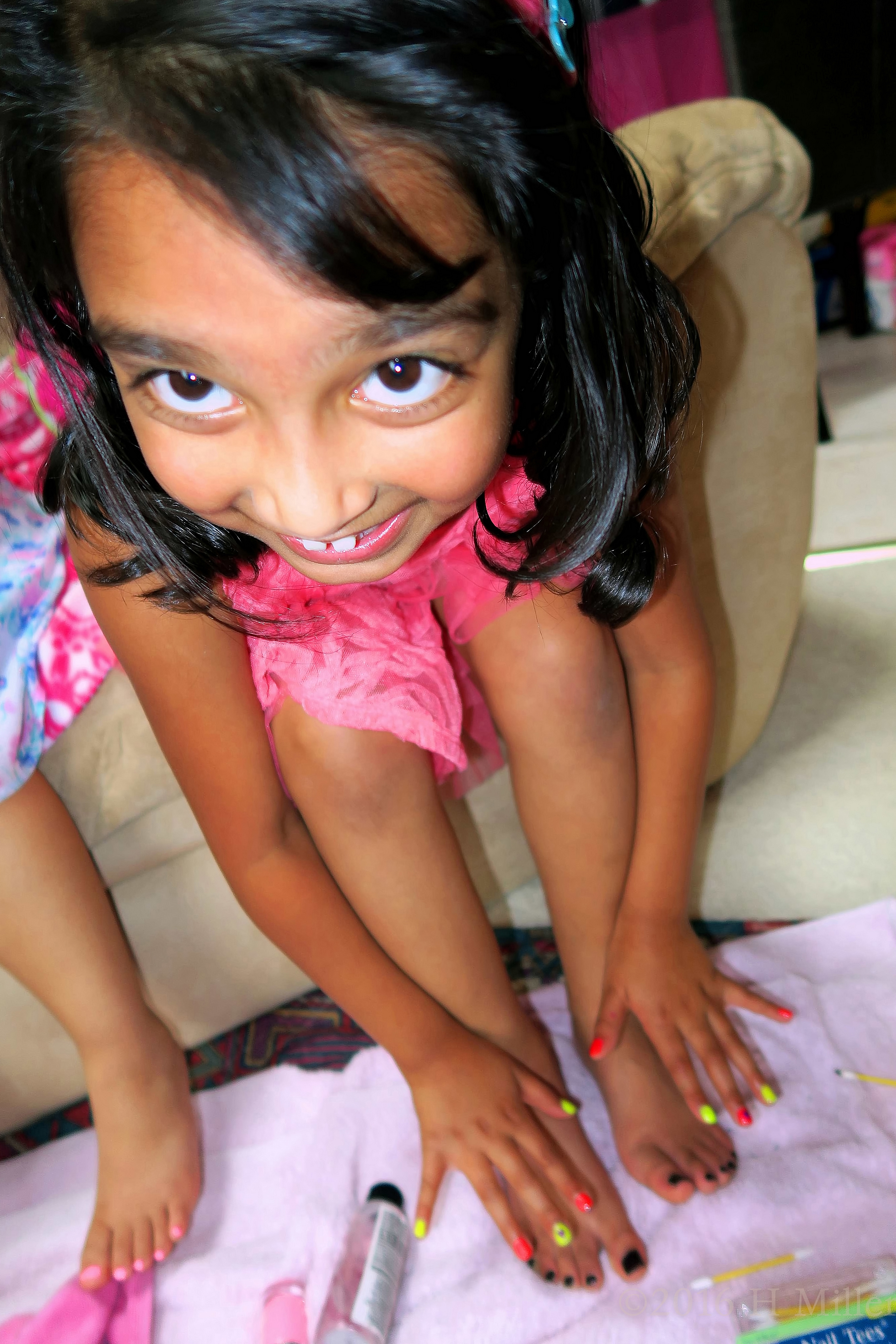 Showing Her Nails. 