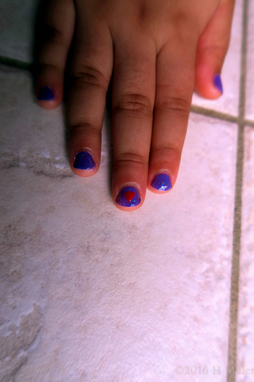 Heart Design On Purple Nail. Heart Design On Purple Nail.