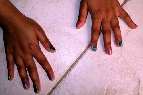 Kids Mini Mani With Hearts And Metallic Green Polish, Alternating With Clear Purple Glitter. Kids Mini Mani With Hearts And Metallic Green Polish, Alternating With Clear Purple Glitter.