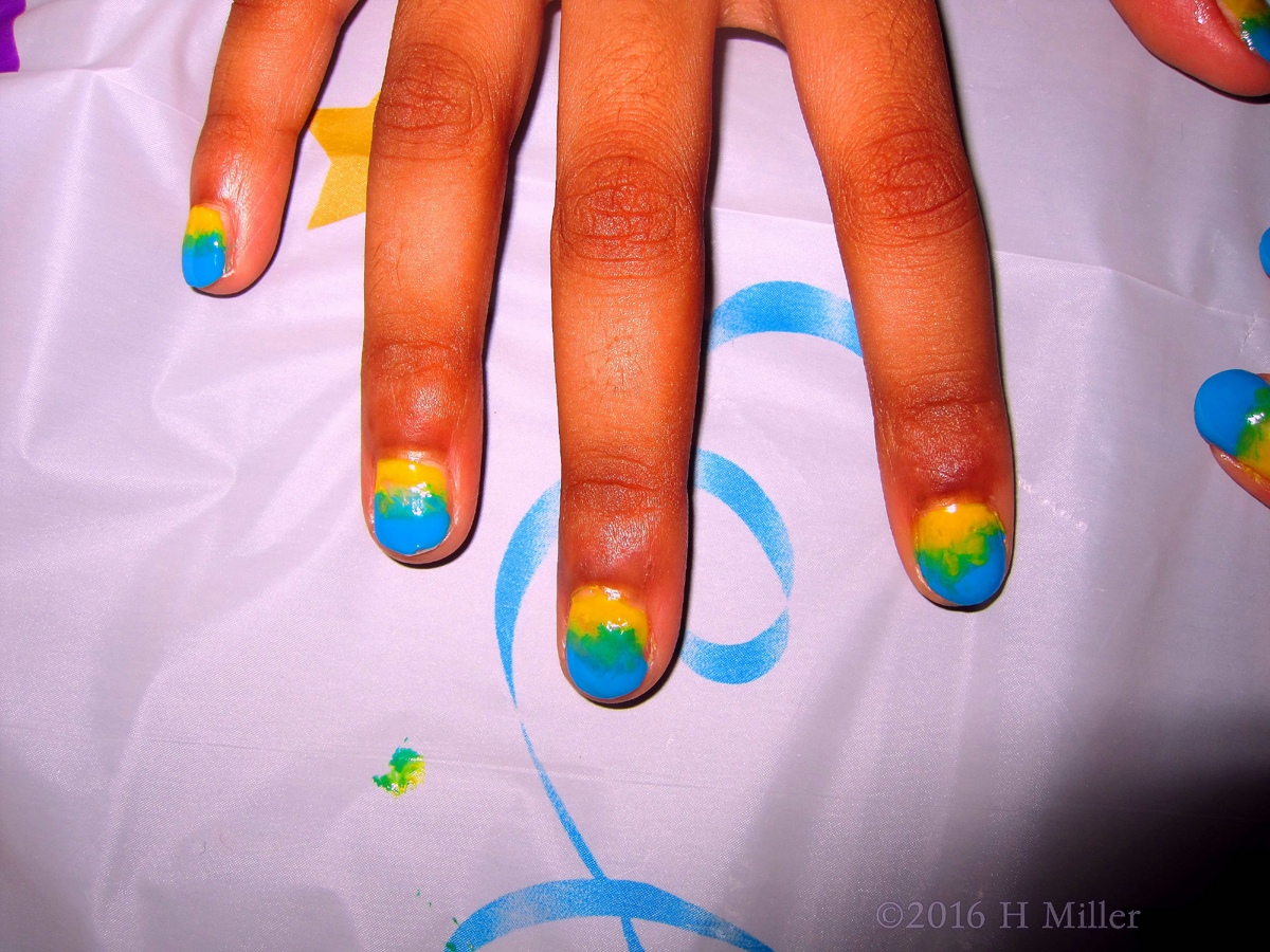 What A Beautiful Blue And Yellow Blended Ombre Kids Manicure! 