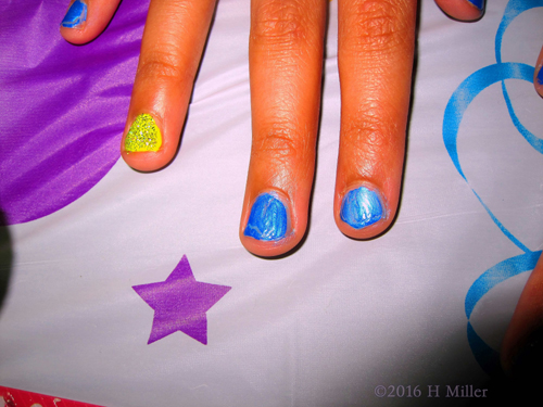 Another View Of This Girls Mani. What Cool Glitter On The Yellow Accent Nail! Another View Of This Girls Mani. What Cool Glitter On The Yellow Accent Nail!