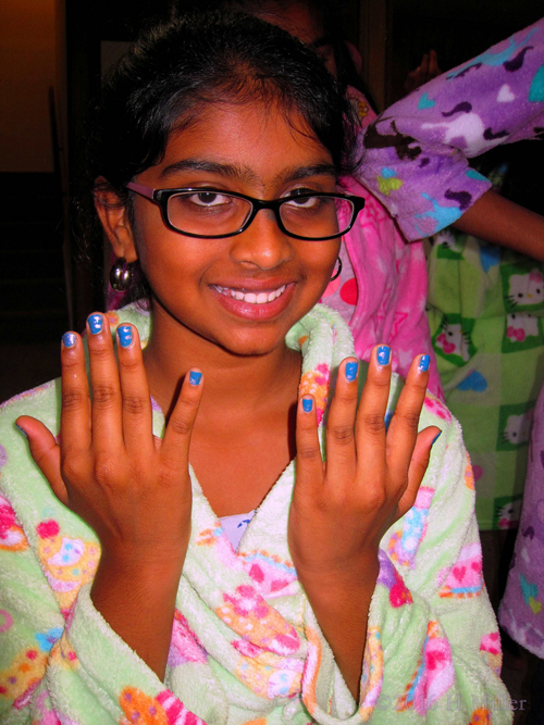 Smiling With Her New Kids Manicure!