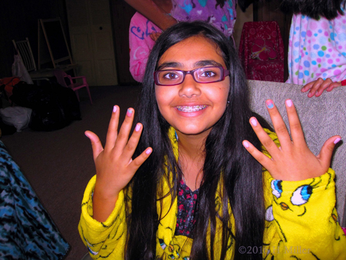 Smiling With Her New Kids Mini Manicure. Smiling With Her New Kids Mini Manicure.