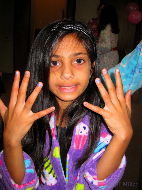 She Likes Her New Mini Mani She Likes Her New Mini Mani