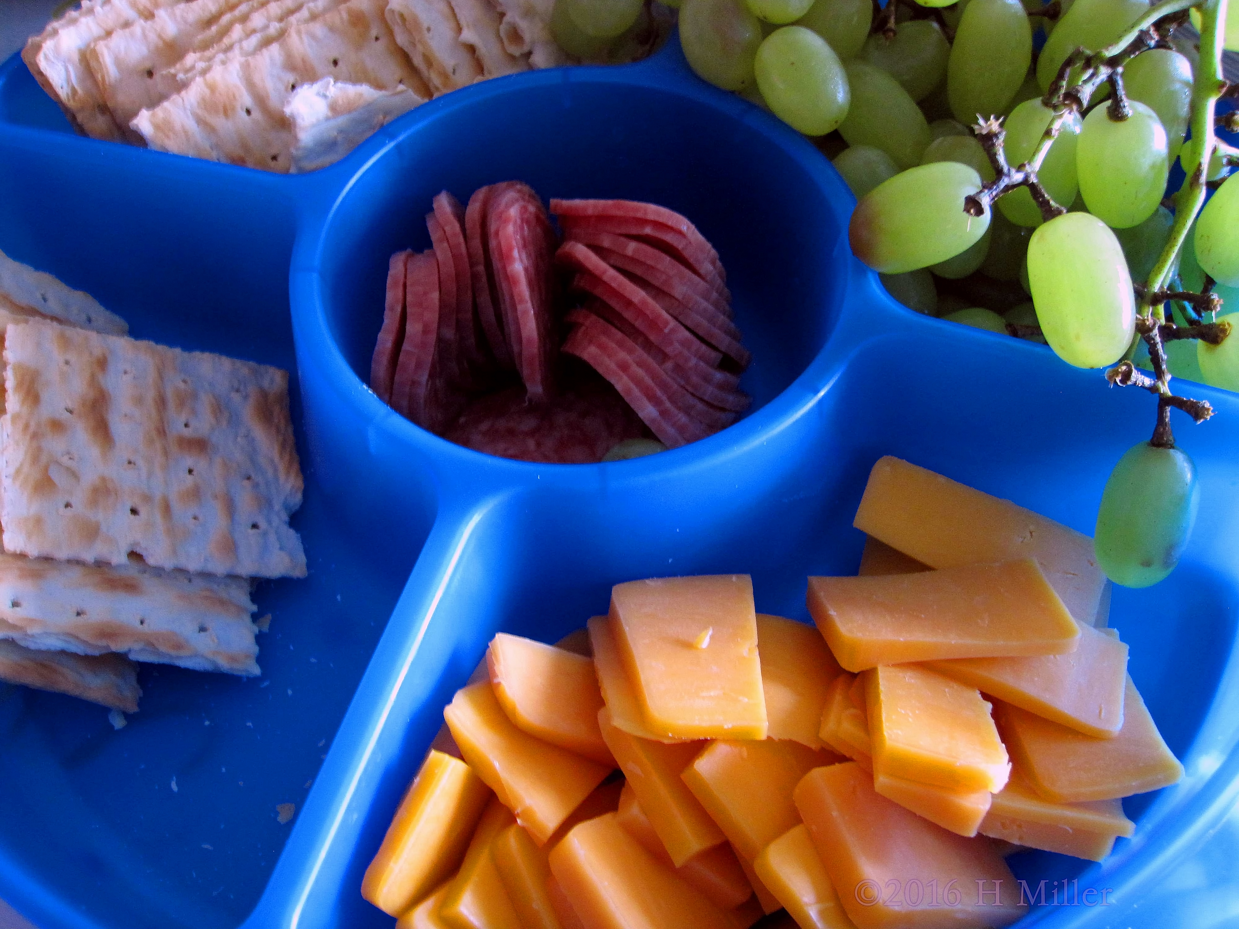 Yummy Cheese, Crackers, Grapes, And Pepperoni For Snacks Yummy Cheese, Crackers, Grapes, And Pepperoni For Snacks