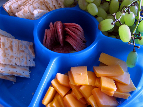 Yummy Cheese, Crackers, Grapes, And Pepperoni For Snacks
