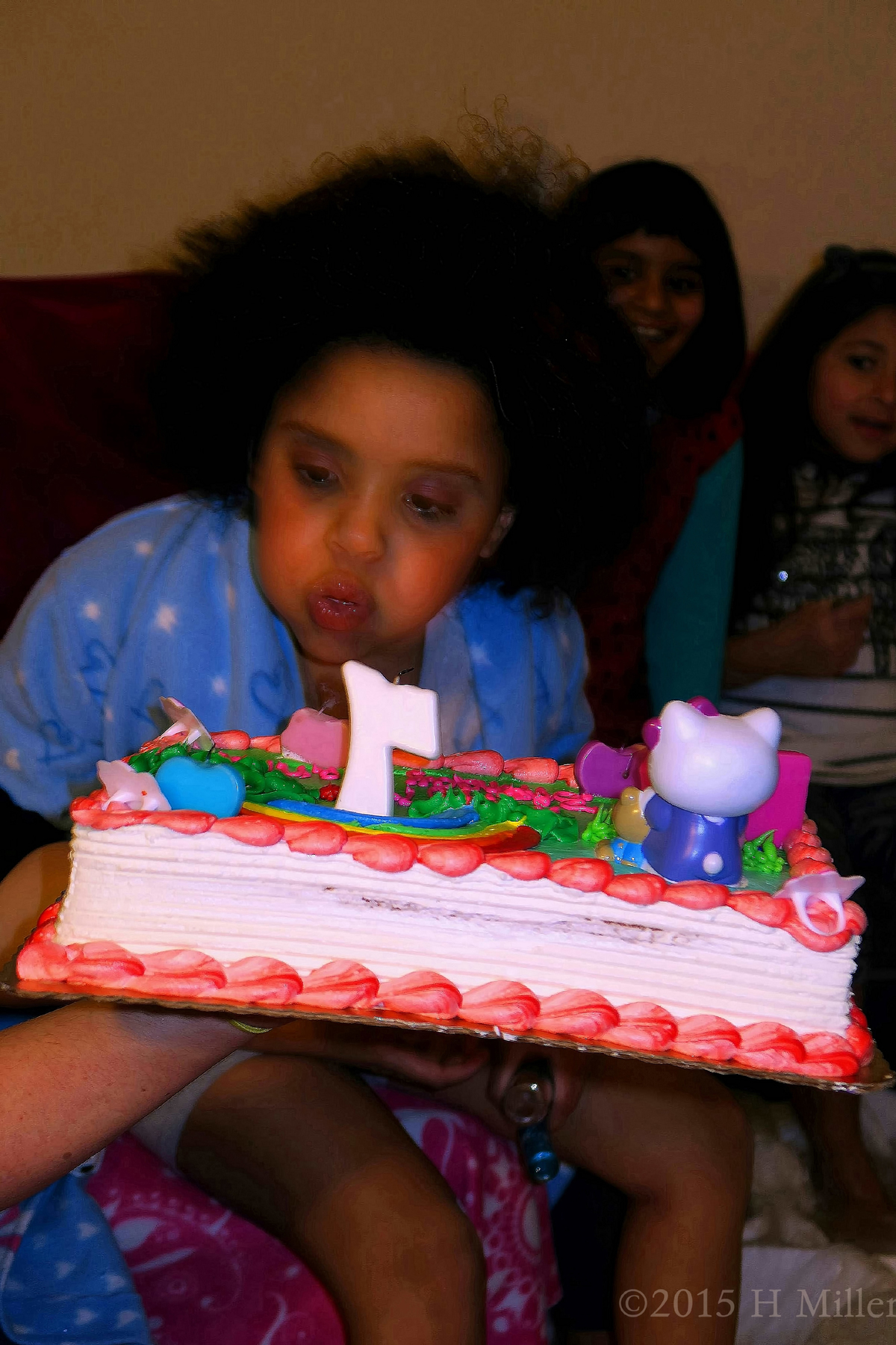 Blowing Out The Birthday Candles On Her Spa Birthday Party Cake! 