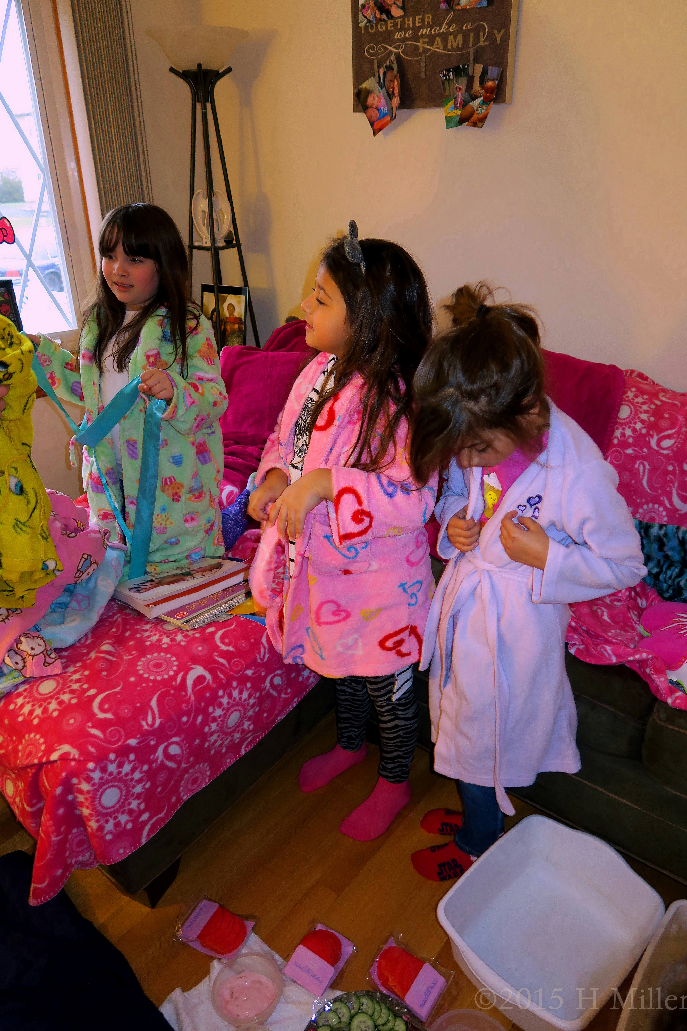 Checking To Make Sure Her Kids Robe Sash Is Tied Checking To Make Sure Her Kids Robe Sash Is Tied