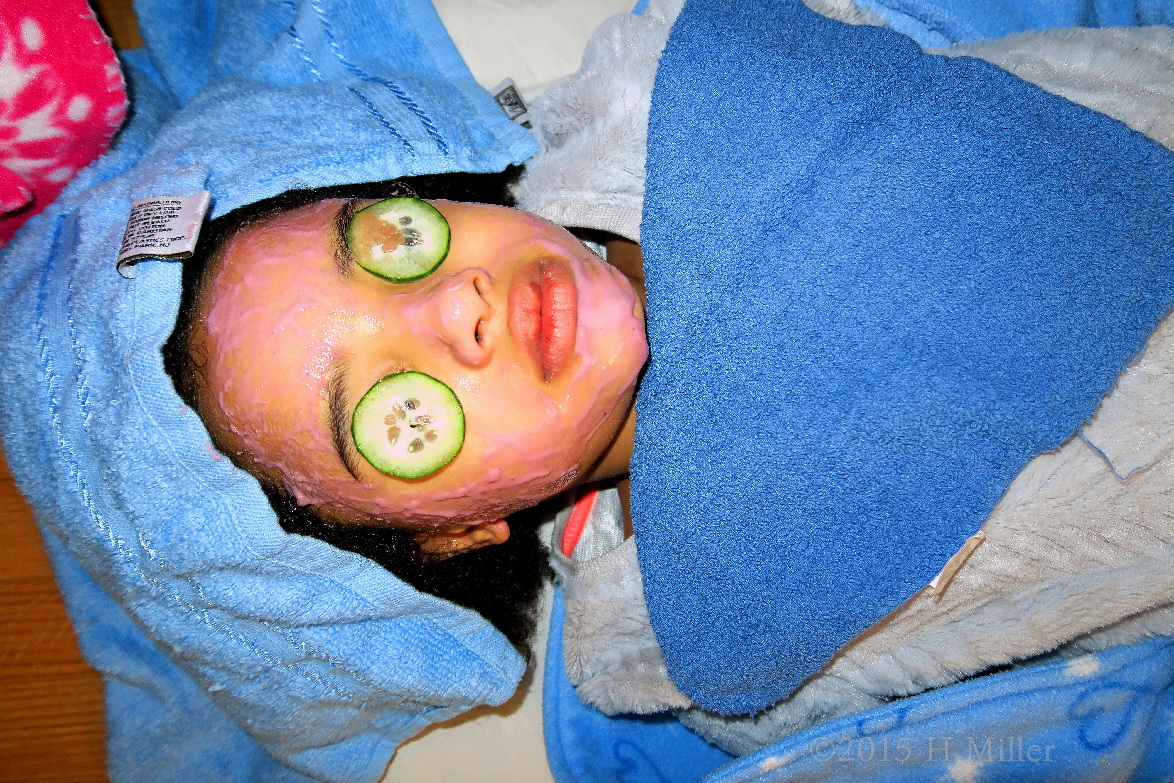 Protecting Her Neck With A Fresh Towel During The Kids Facial Activity! Protecting Her Neck With A Fresh Towel During The Kids Facial Activity!