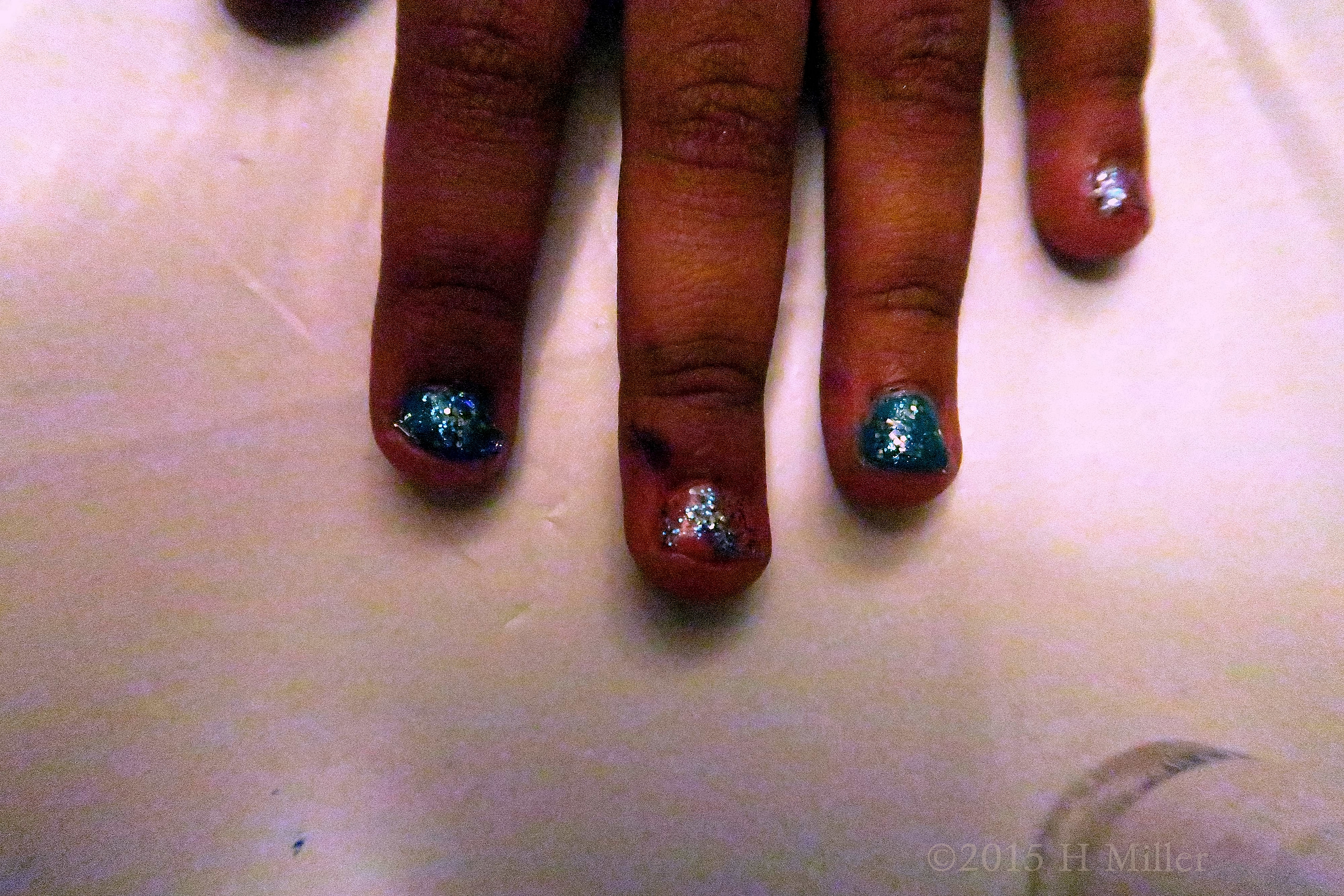 Blue Glitter Over Pink And Blue For This Girls Manicure Blue Glitter Over Pink And Blue For This Girls Manicure