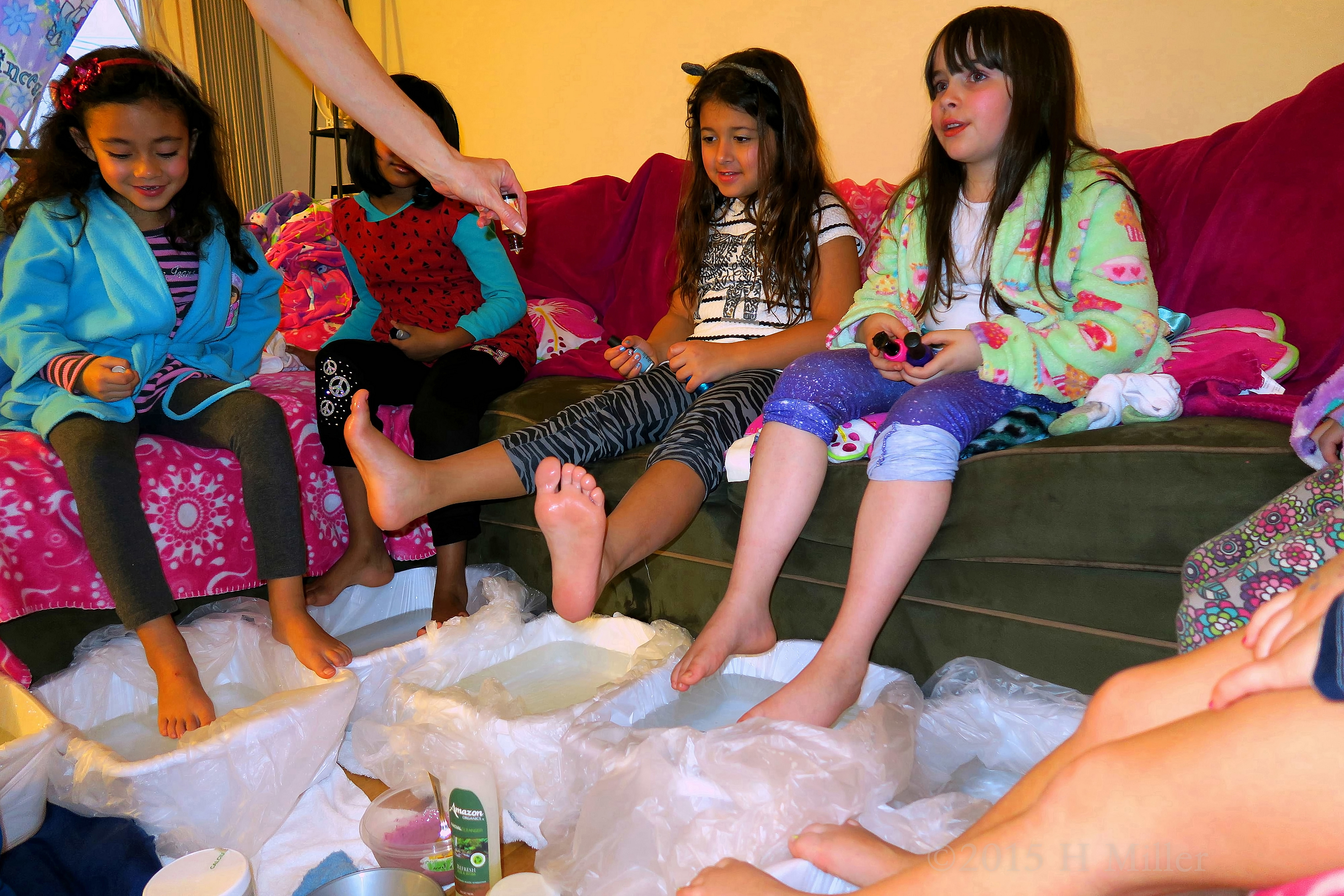Relaxing In The Footbaths Before Their Mini Pedicure With Essential Oil Relaxing In The Footbaths Before Their Mini Pedicure With Essential Oil