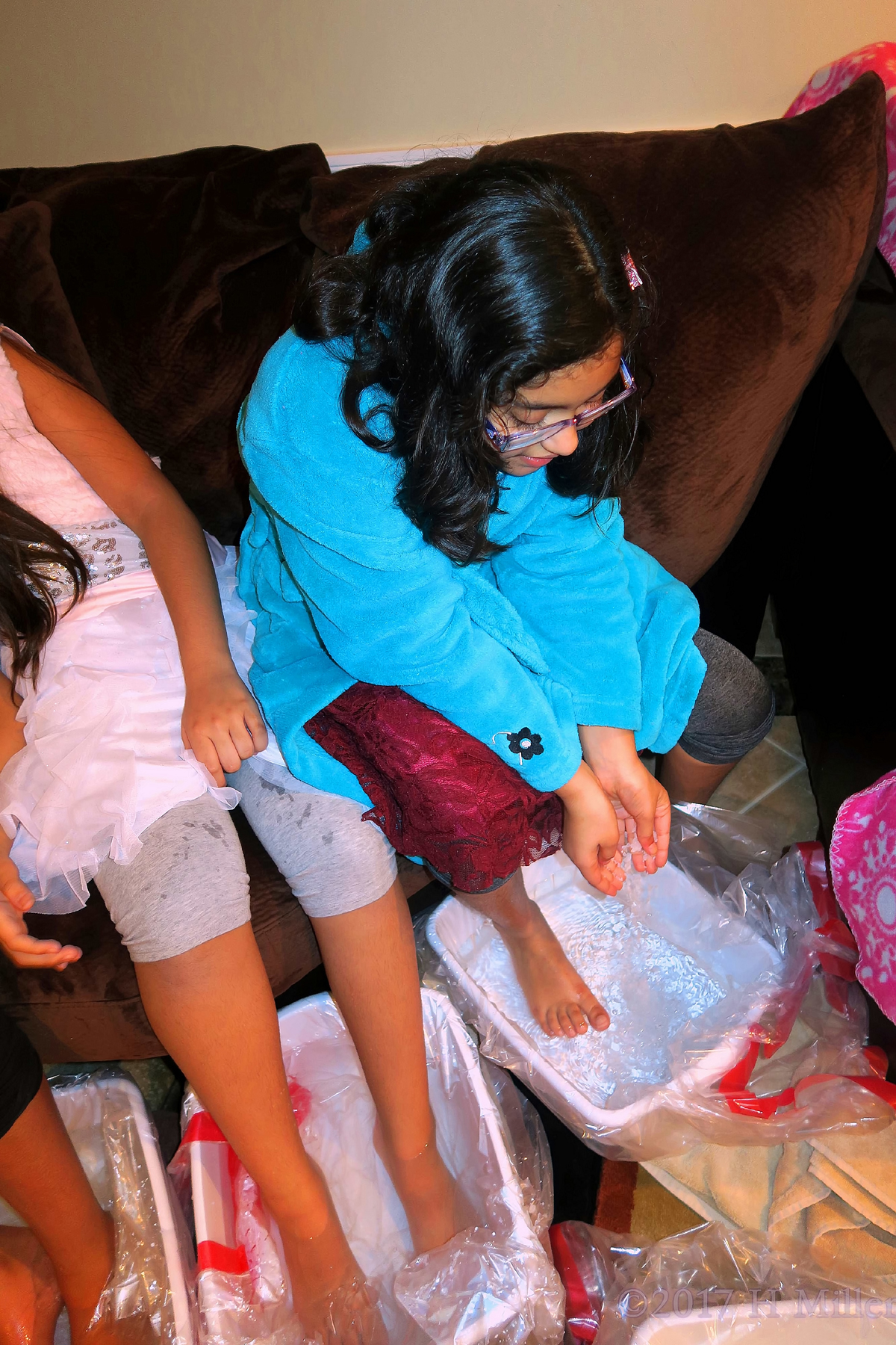 Putting The Halite Salt In Her Kids Spa Footbath. 