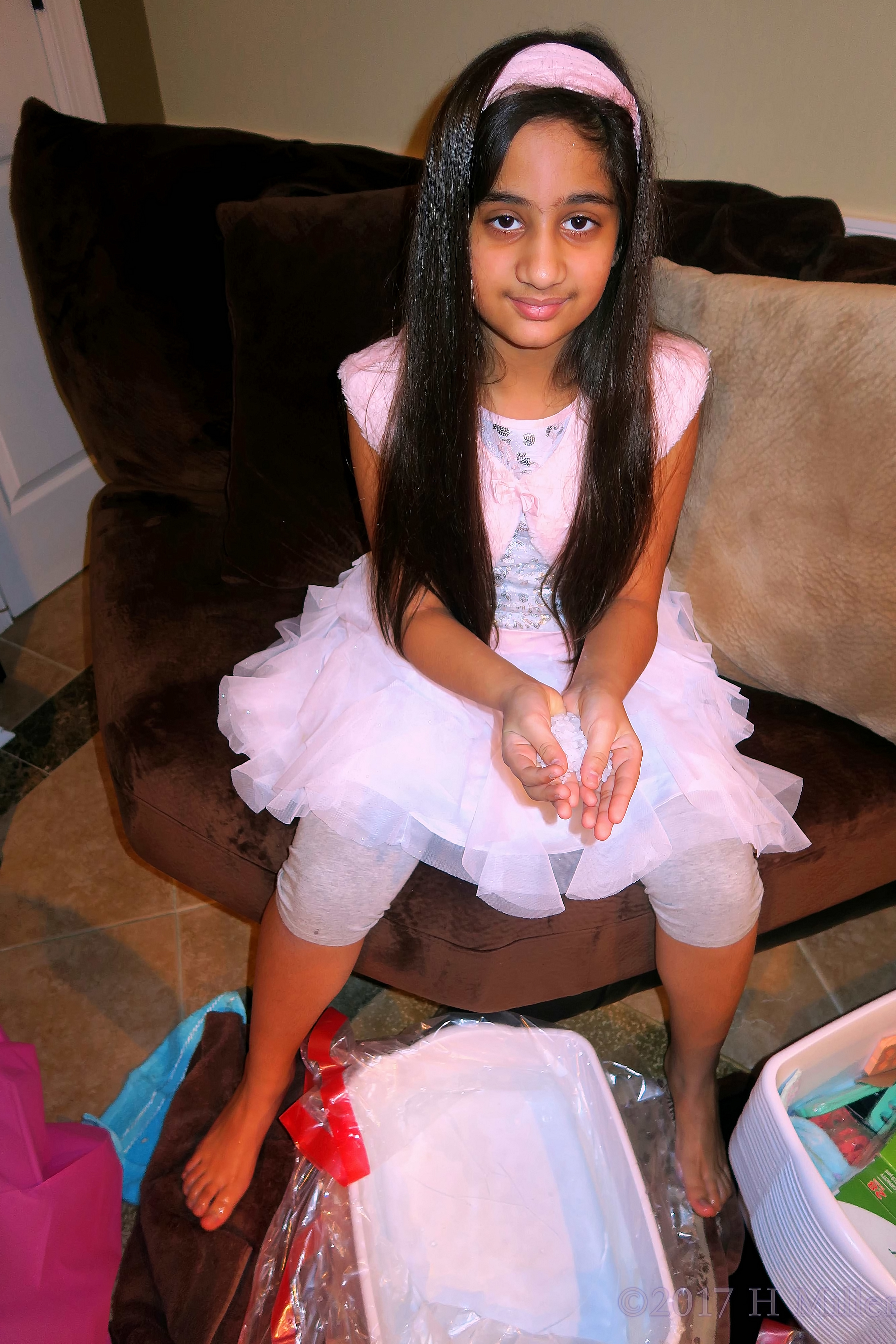 Holding The Halite Salt Before The Kids Pedicure Footbath. Holding The Halite Salt Before The Kids Pedicure Footbath.