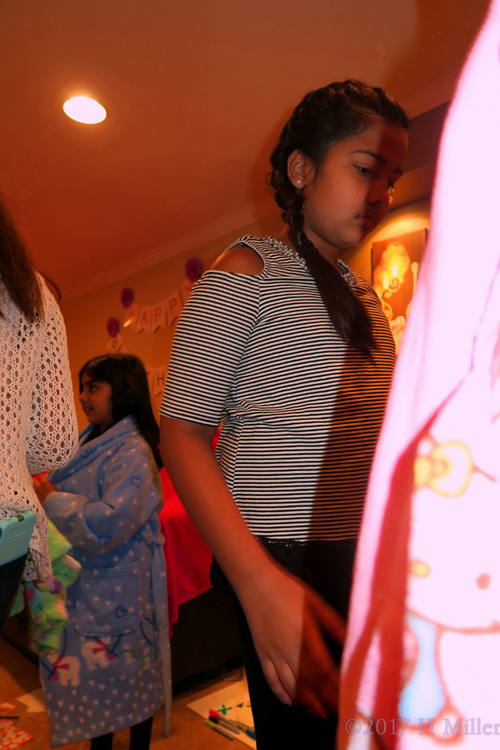 Gathering Around To Pick Out Girls Spa Robes. Gathering Around To Pick Out Girls Spa Robes.