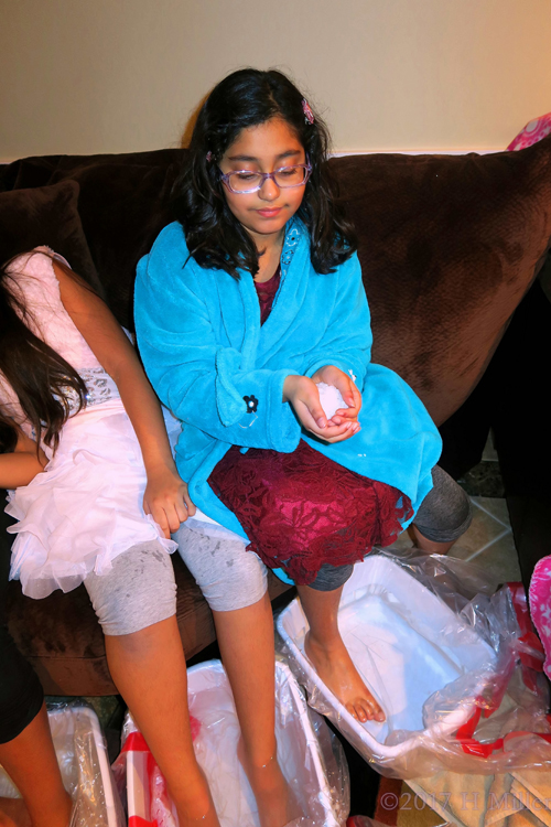 Holding The Salt For The Kids Pedicure Footbath. Holding The Salt For The Kids Pedicure Footbath.