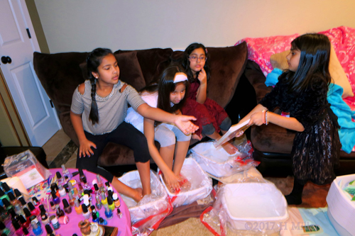 Looking At Books Together During The Girls Spa Pedicures. Looking At Books Together During The Girls Spa Pedicures.