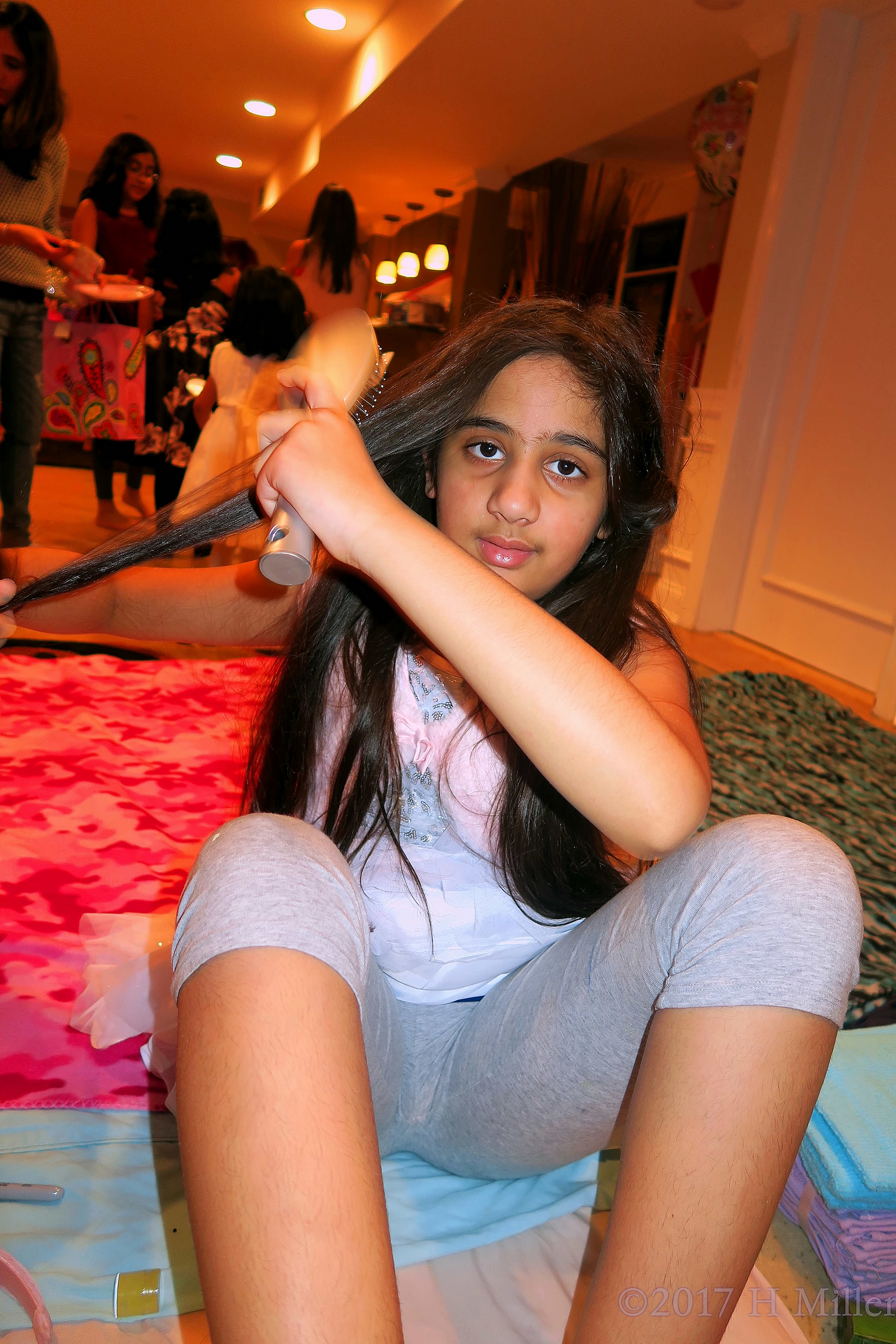 Brushing Her Hair In Preparation For Her French Braid Hairstyle At The Spa Party For Girls. Brushing Her Hair In Preparation For Her French Braid Hairstyle At The Spa Party For Girls.