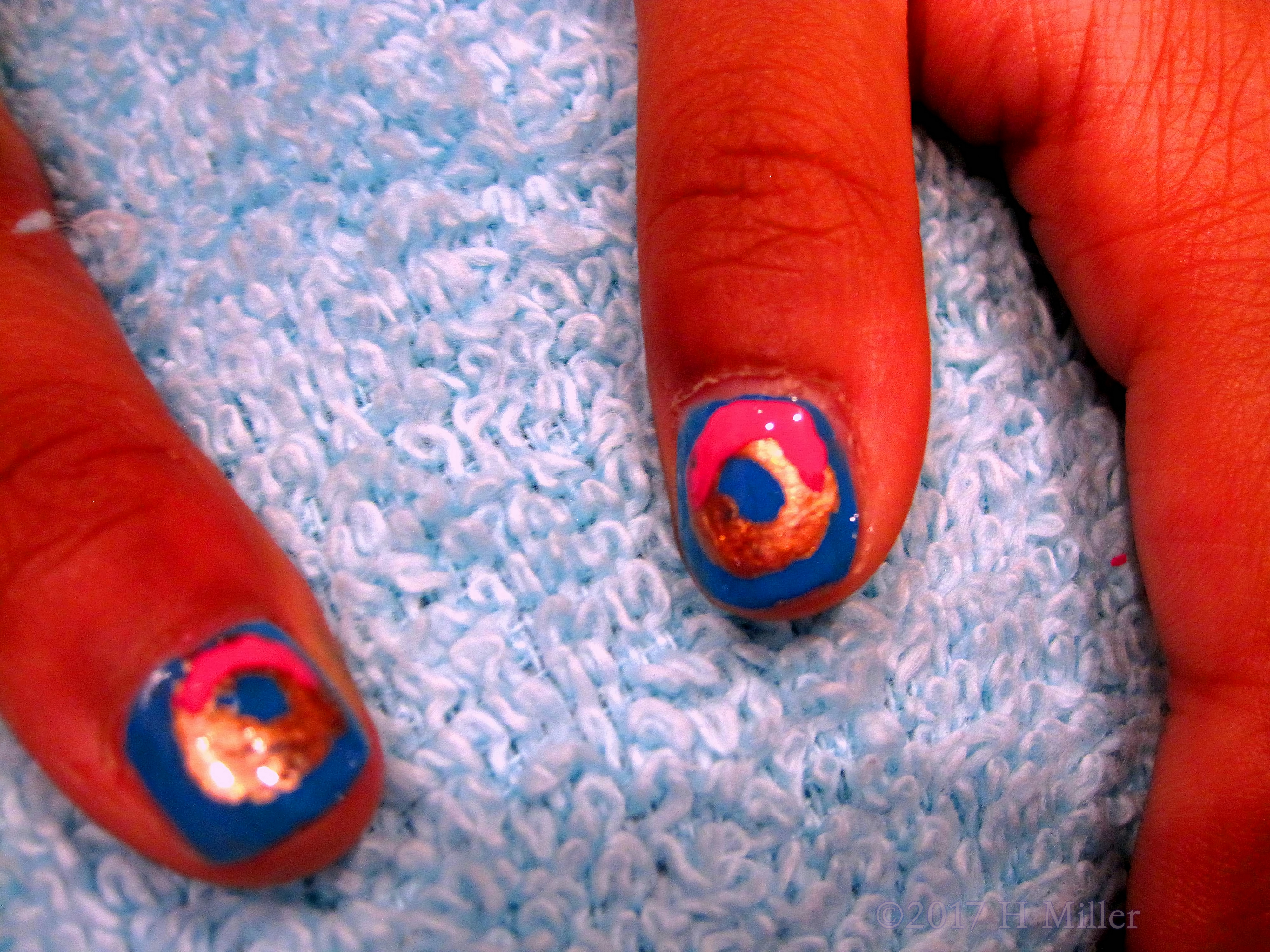 Closeup Of The Mini Mani Nail Art Design.