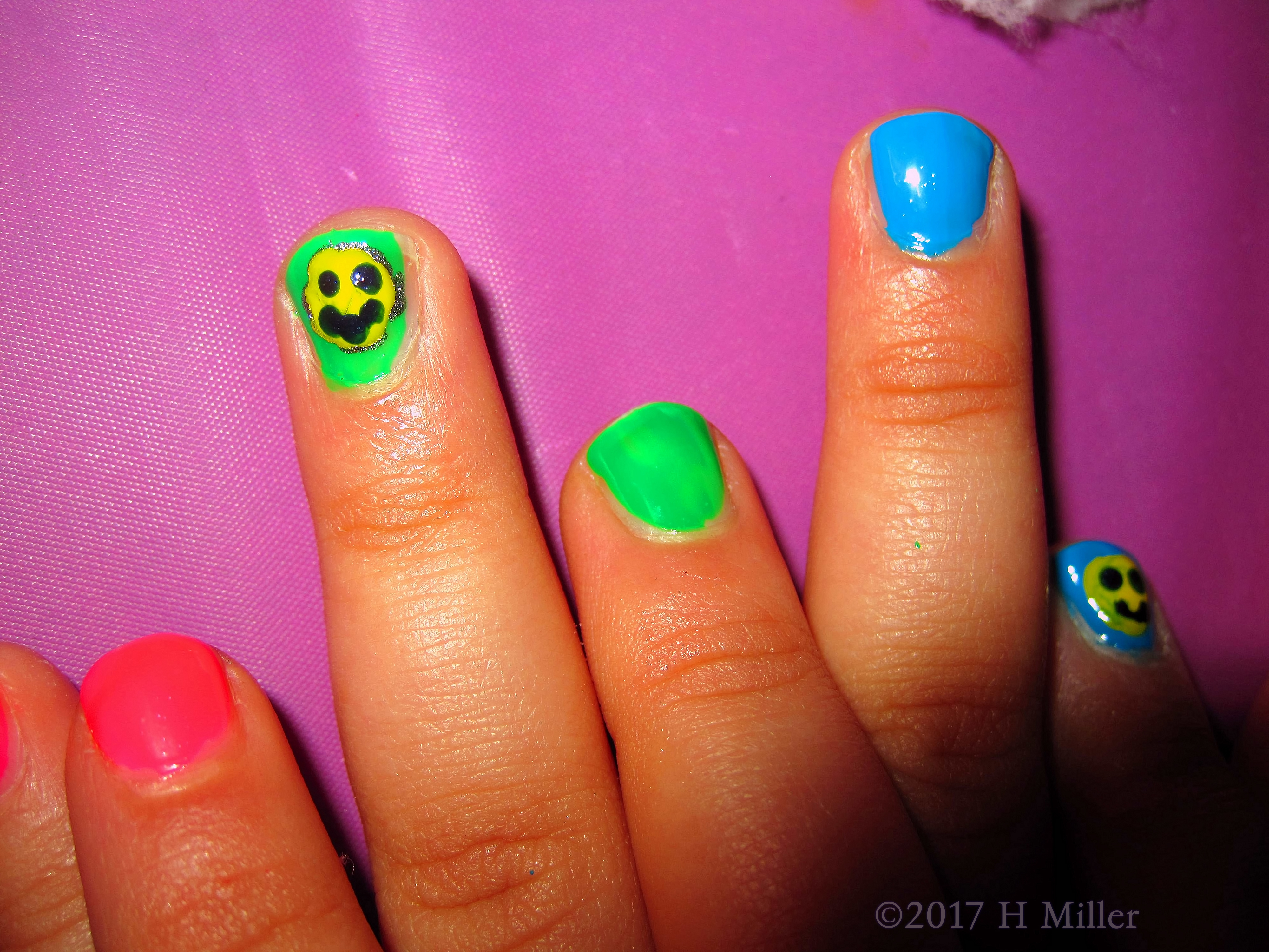 Closeup Of The Smiley Face Kids Spa Nail Design. Closeup Of The Smiley Face Kids Spa Nail Design.