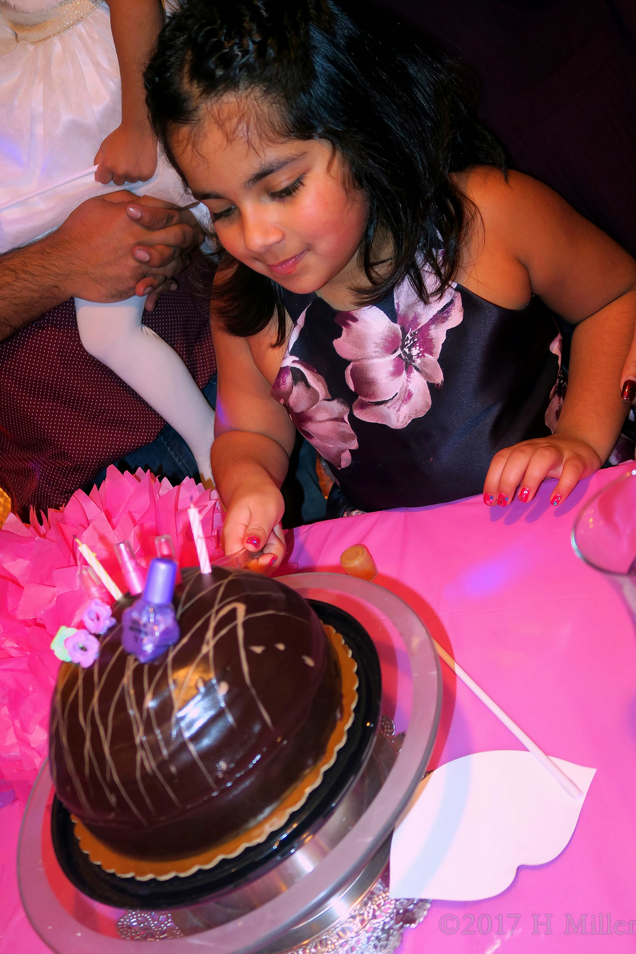 Making The First Cut Of Birthday Cake. Making The First Cut Of Birthday Cake.