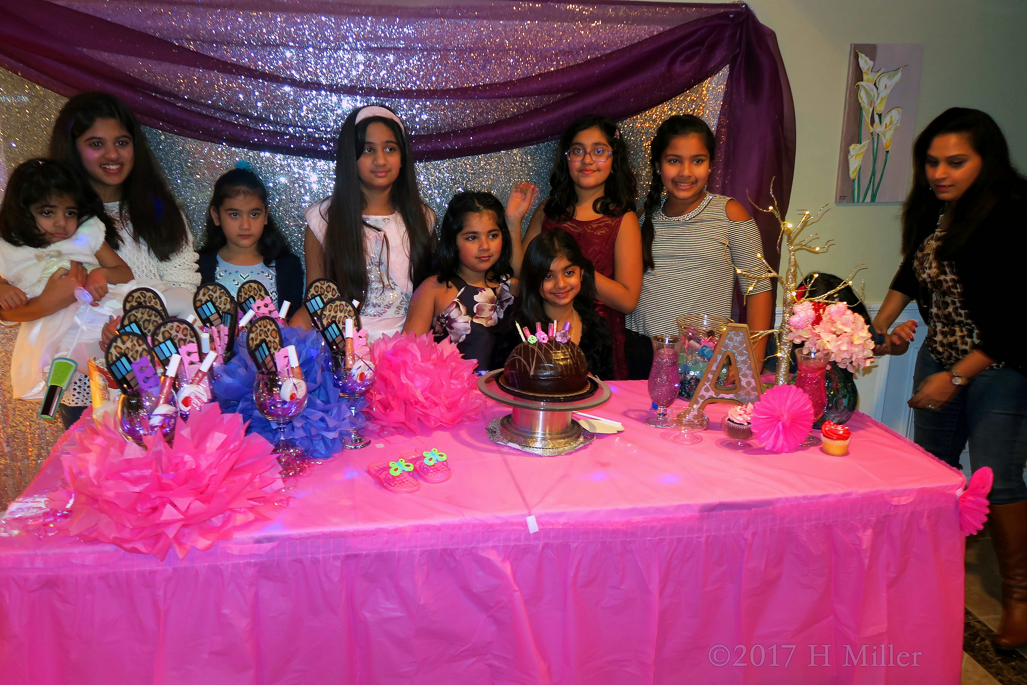 Smiling For Another Group Picture Around The Spa Cake. Smiling For Another Group Picture Around The Spa Cake.