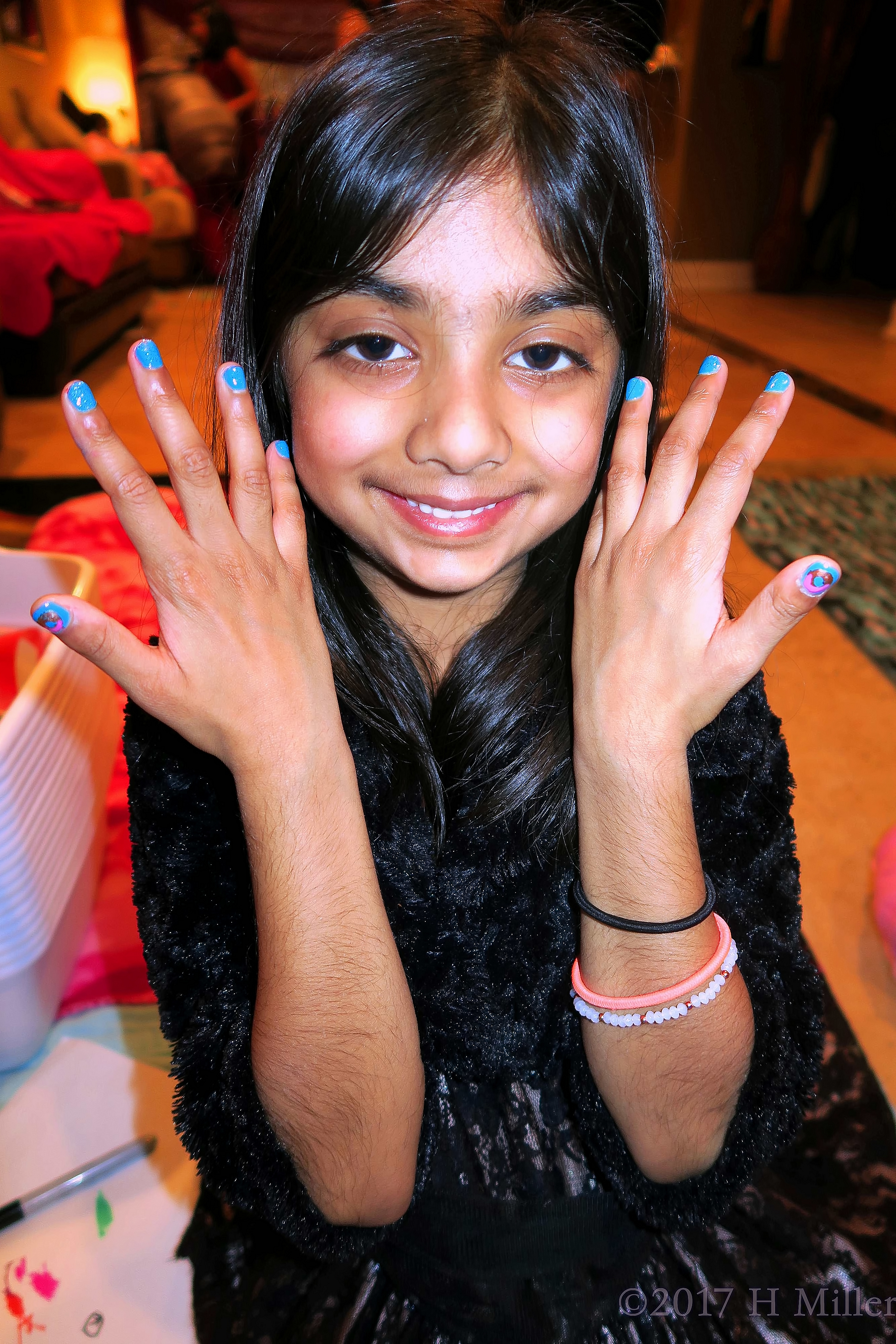 Smiling While Showing Her Mini Manicure At The Girls Spa!