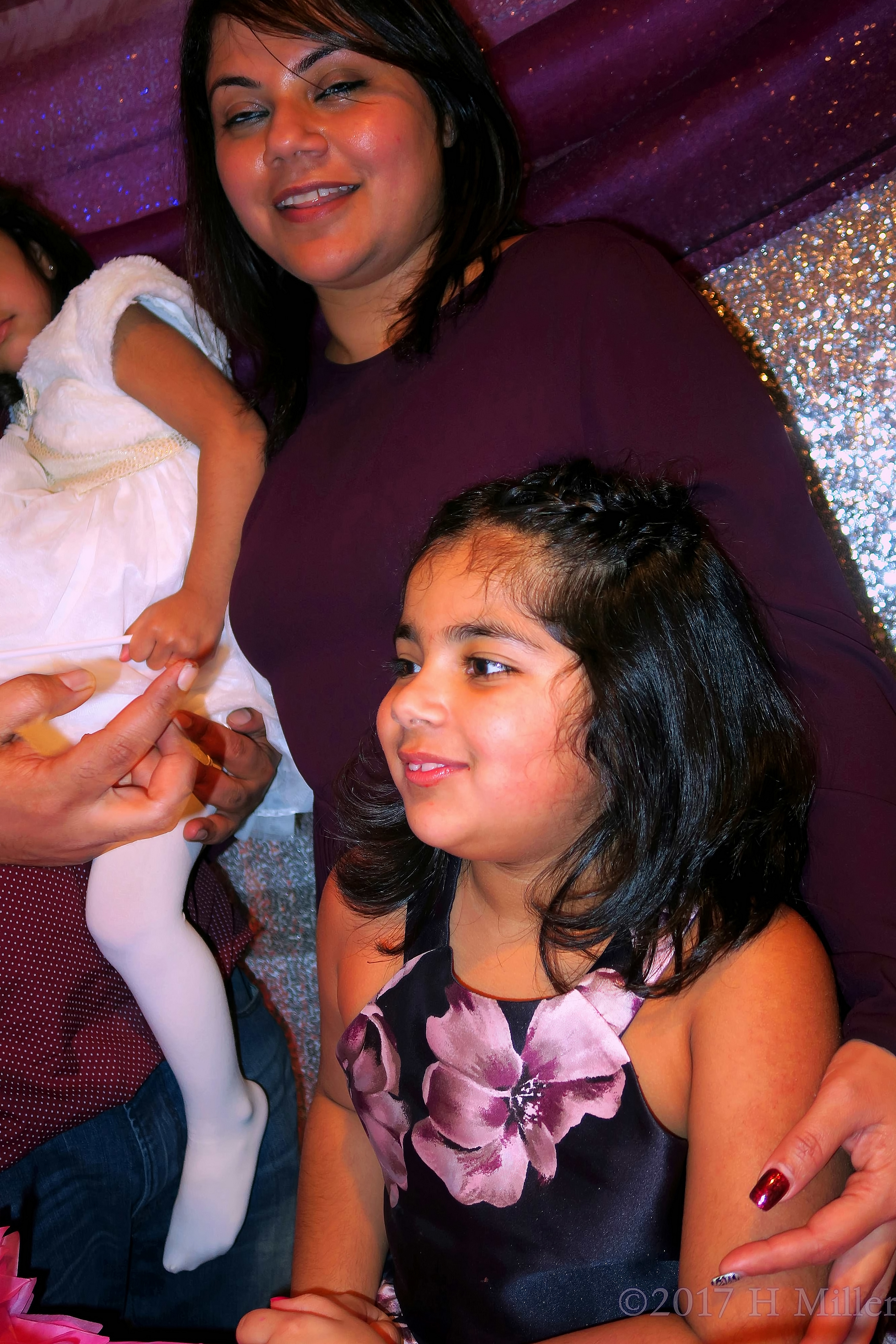 The Birthday Girls And Family Around The Cake. The Birthday Girls And Family Around The Cake.