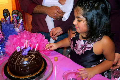 Alaysha Cuts Her Birthday Cake.