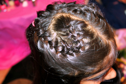 An Above View Of The Heart Shaped Braid Kids Hairstyle.