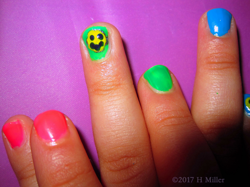 Closeup Of The Smiley Face Nail Design At The Girls Party!