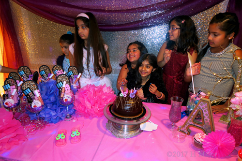 Everybody Smiles For A Picture Behind The Girls Spa Party Cake!