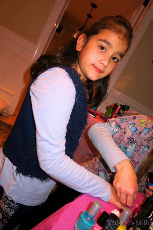 Getting Her Kids Spa Manicure Done. Getting Her Kids Spa Manicure Done.