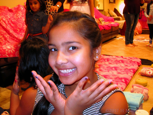 She Loves Her Brand New Girls Mini Mani From The Kids Spa. She Loves Her Brand New Girls Mini Mani From The Kids Spa.