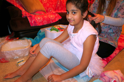 Smiling While Getting Her Kids Hairstyle. Smiling While Getting Her Kids Hairstyle.