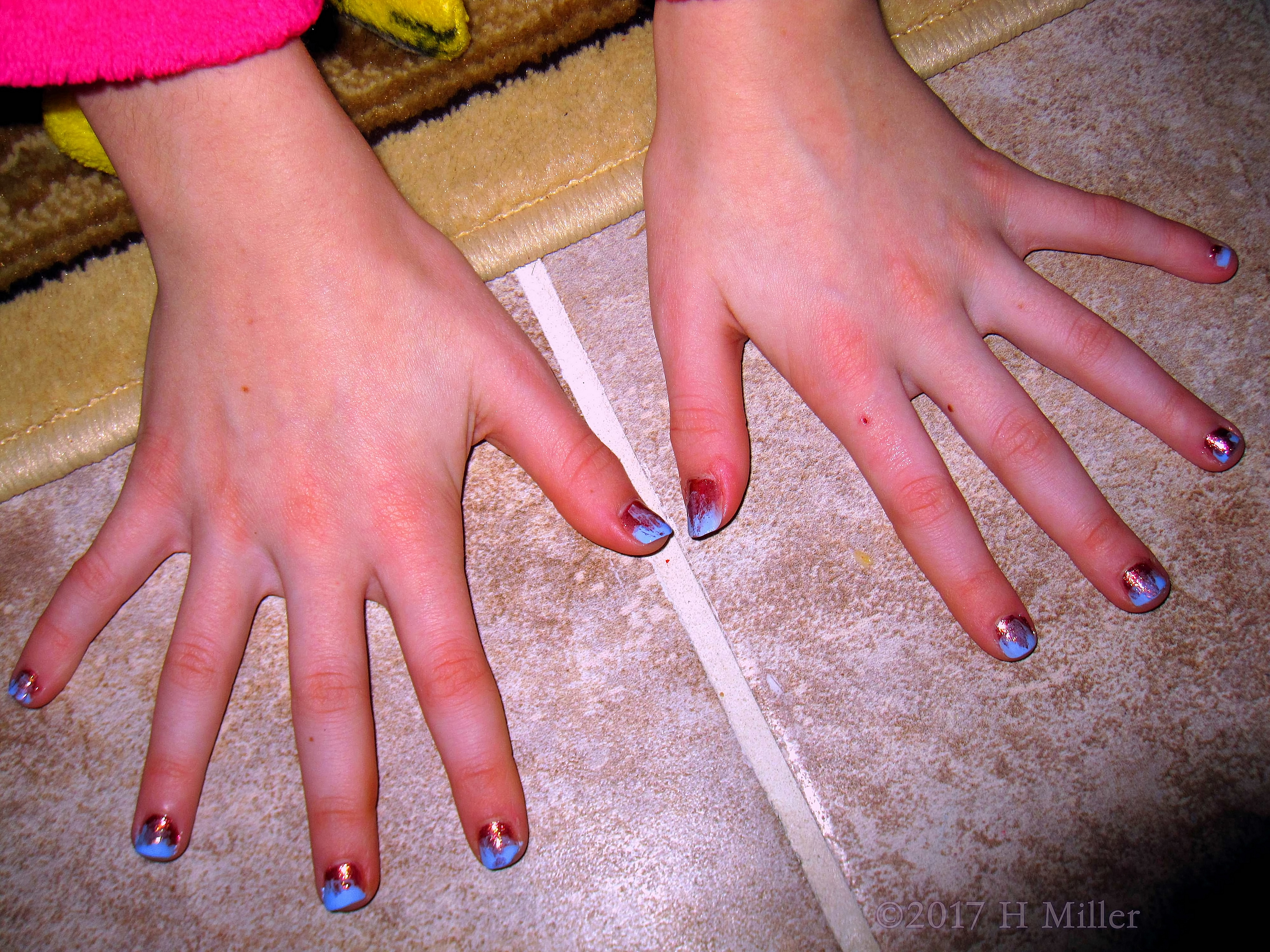 A Closer Shot Of Her New Ombre Kids Manicure. 