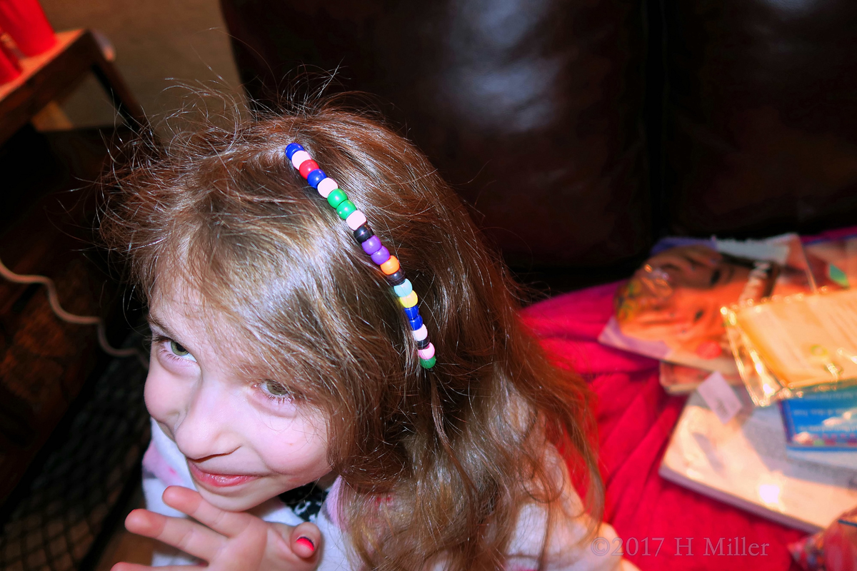Multi Colored Bead Strand For This Girls Hairstyle! 