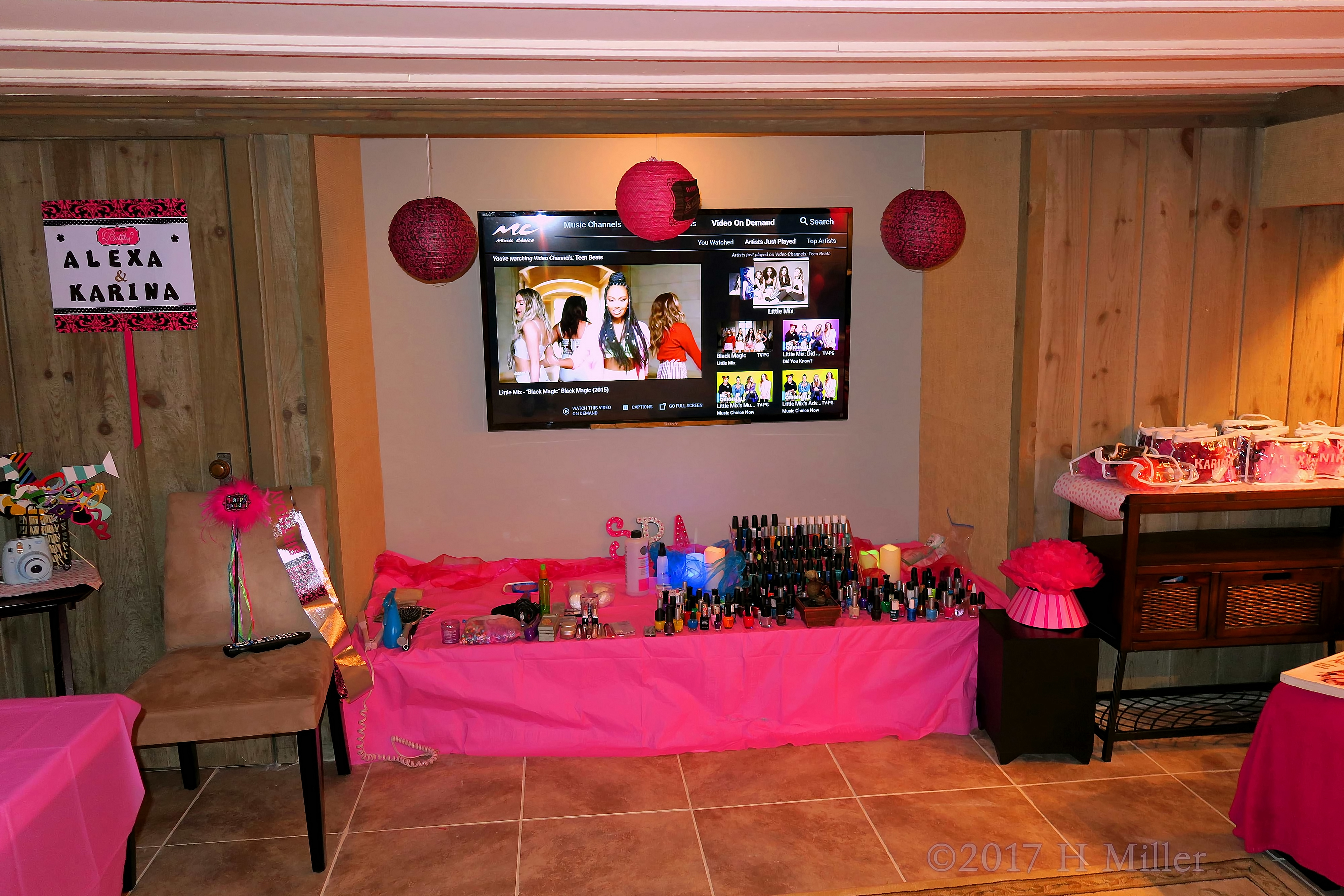 A Long Shot Of The Kids Spa Nail Polish And Hair Setup. 