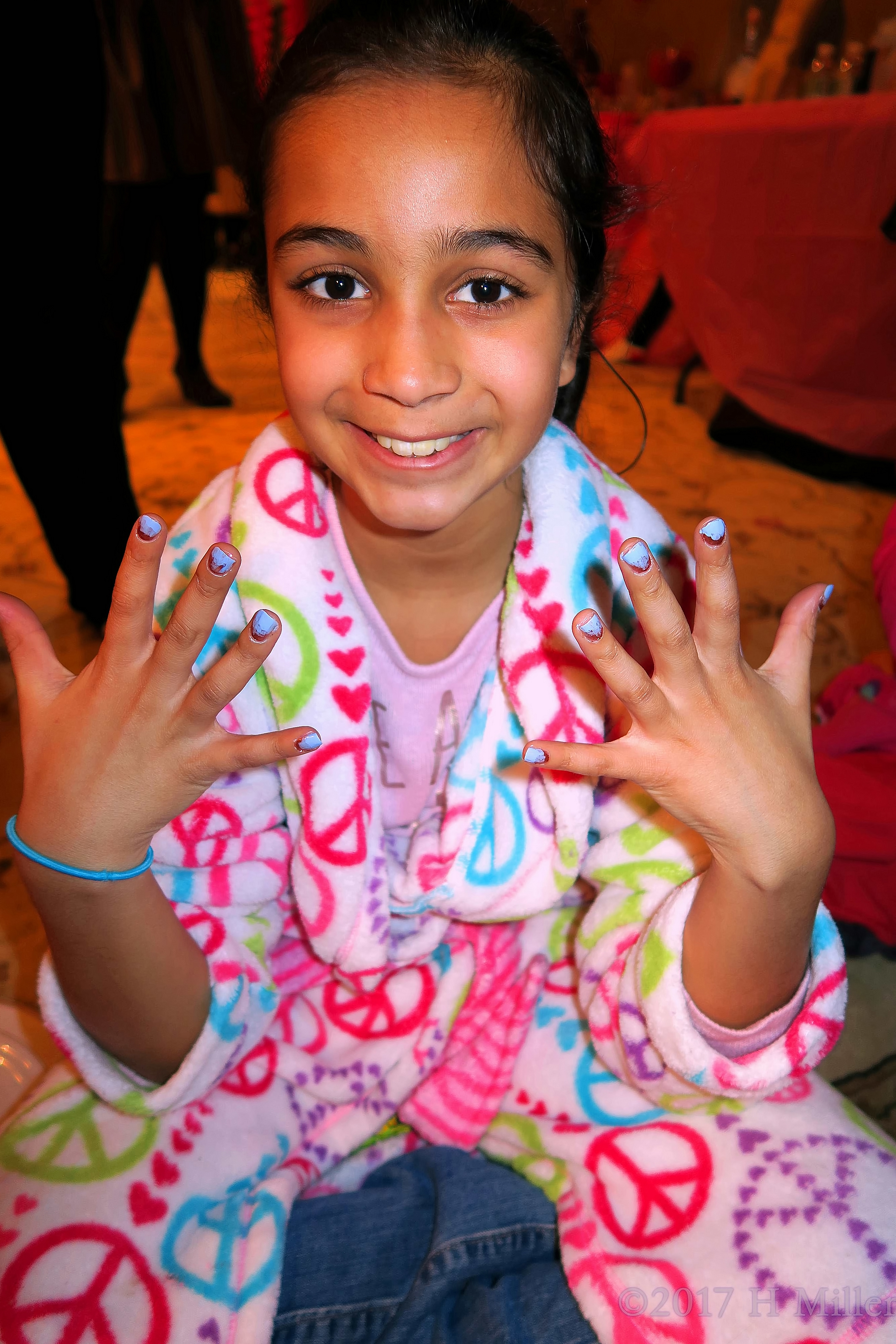 Smiling With Her New Kids Manicure. 