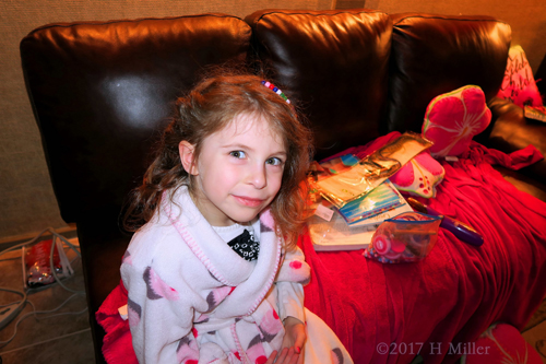 Getting Beads For Her Hairstyle At The Spa.