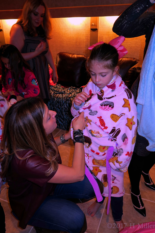 Getting Help From One Of The Moms Getting Help From One Of The Moms