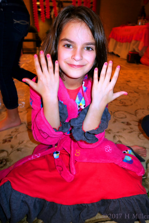 Smiling With Her Pink And Glitter Kids Manicure. Smiling With Her Pink And Glitter Kids Manicure.