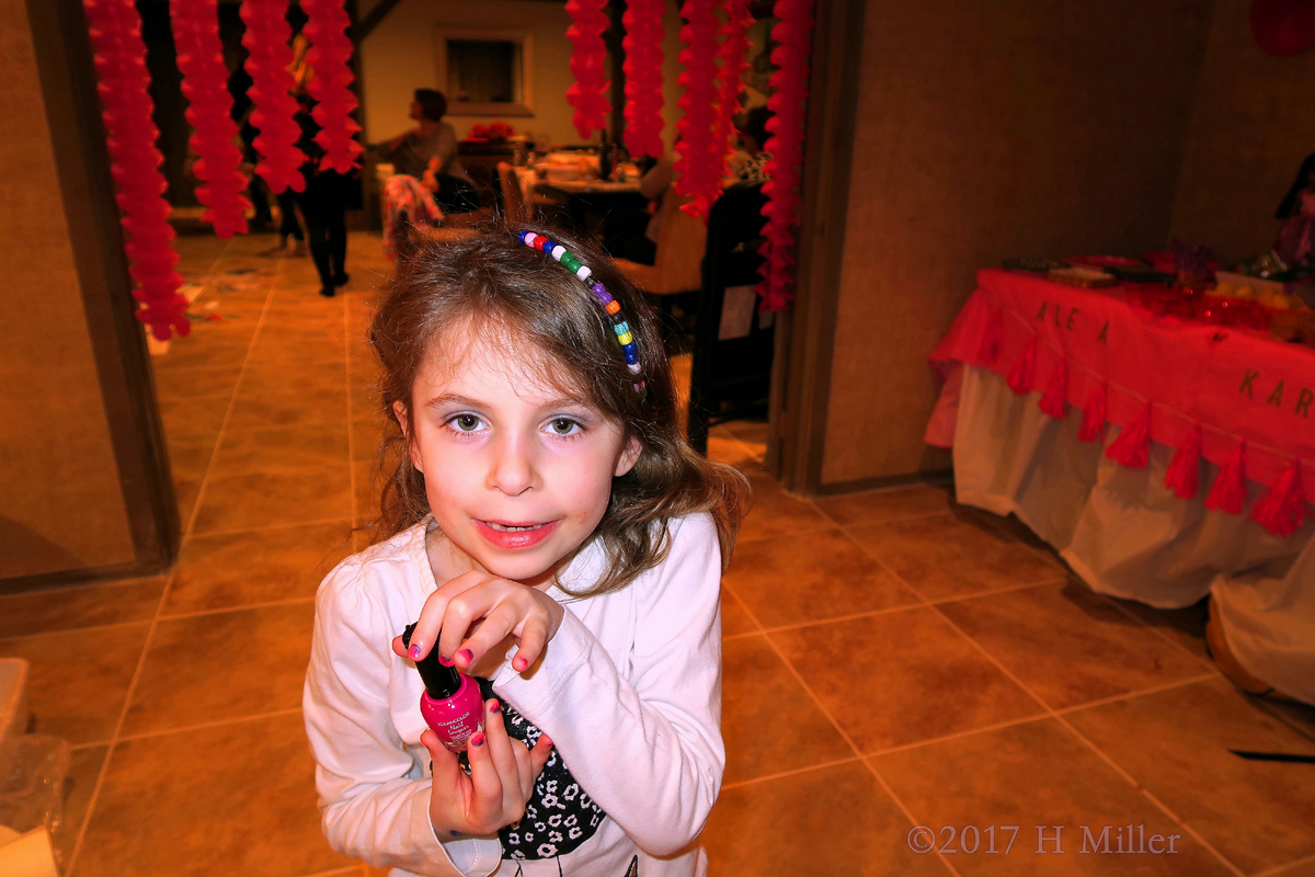 She Loves Her Nail Polish Color, And She Has Eyeshadow, Too! 