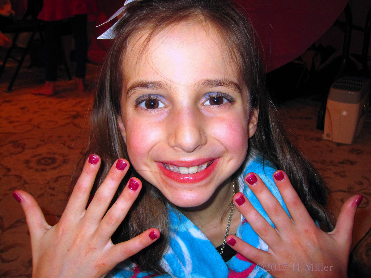 Smiling With Her New Mini Manicure With Purple Nail Polish!