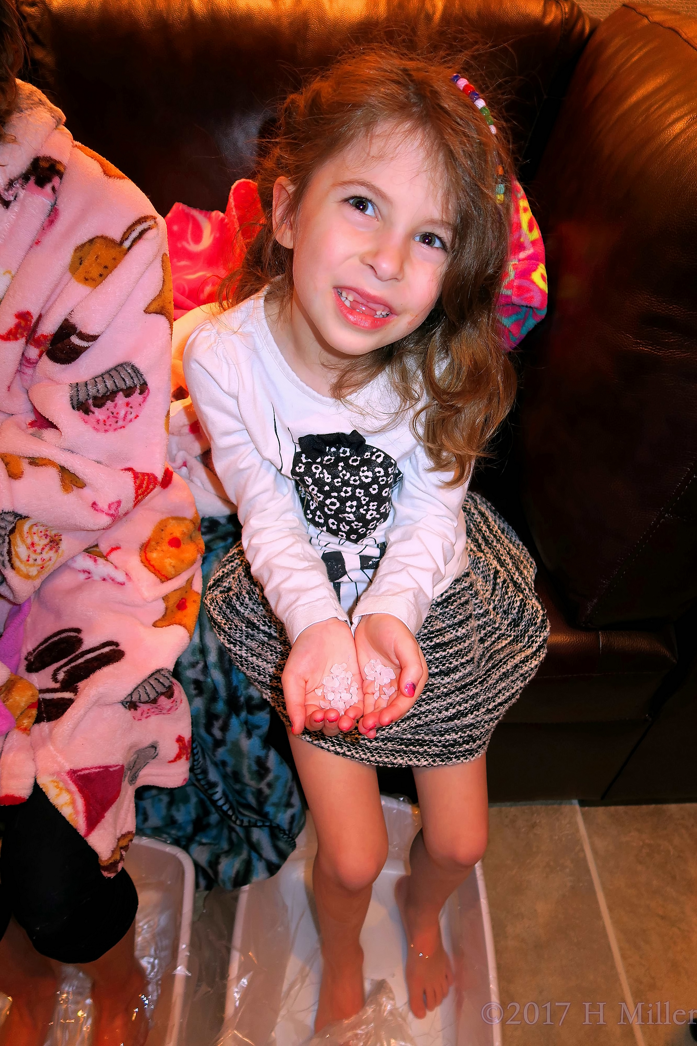 Smiling Duiring Her Kids Pedicure. Smiling Duiring Her Kids Pedicure.