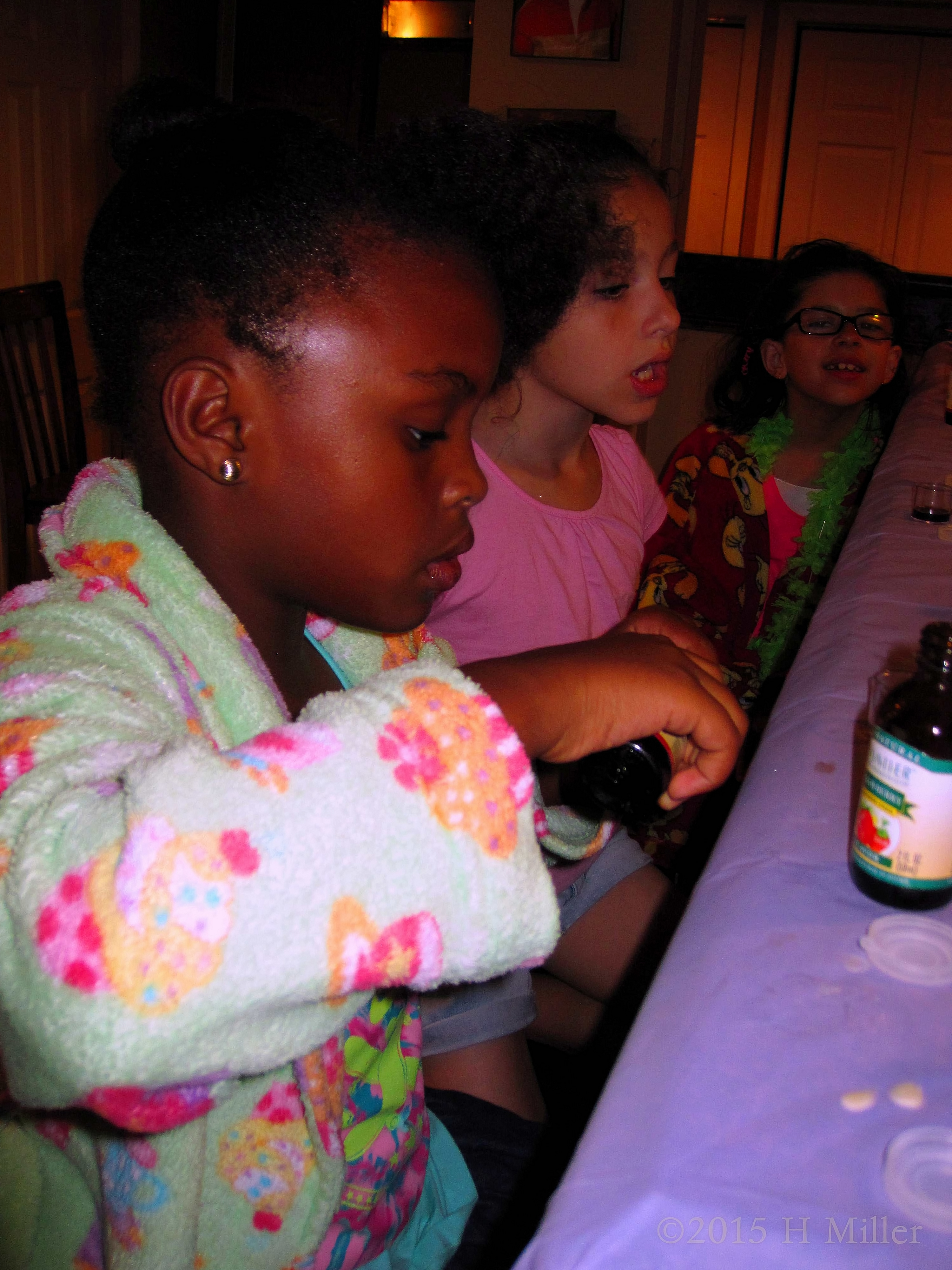 The Girls Sitting Around Doing The Lip Balm Craft. The Girls Sitting Around Doing The Lip Balm Craft.